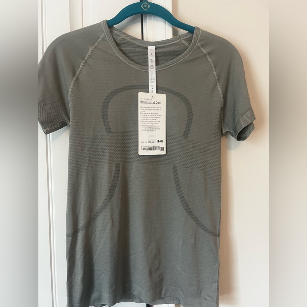 Lululemon running shirt. Size 6.  New with tags.